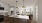 a kitchen with white cabinets