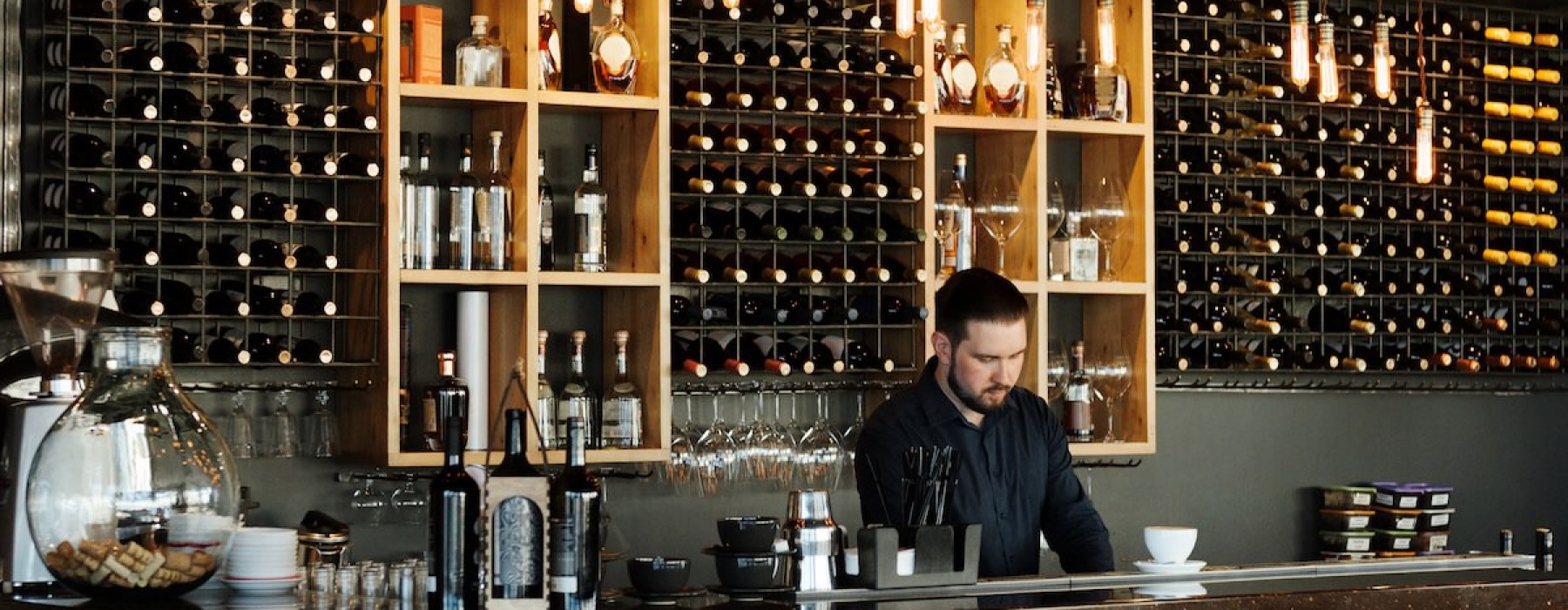 a person behind a bar