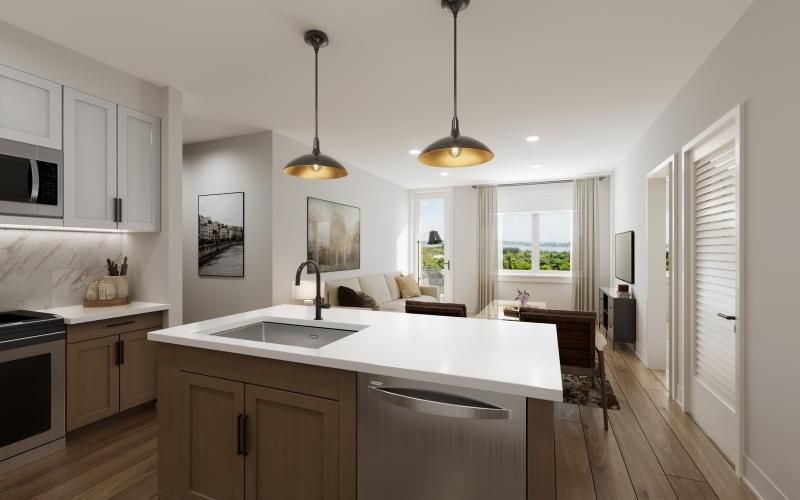 a kitchen with white cabinets